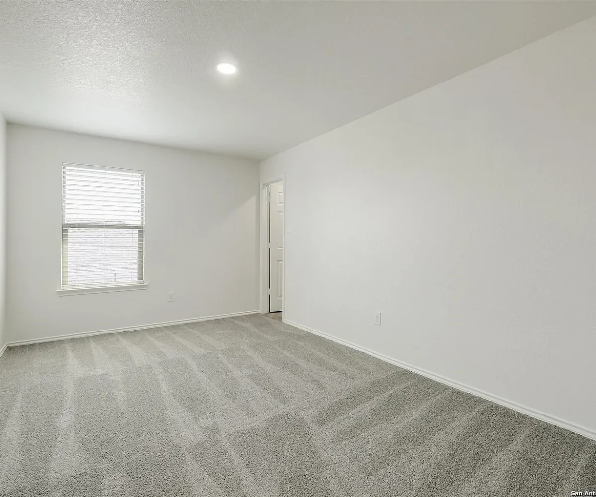Bedroom of a KB home for sale.