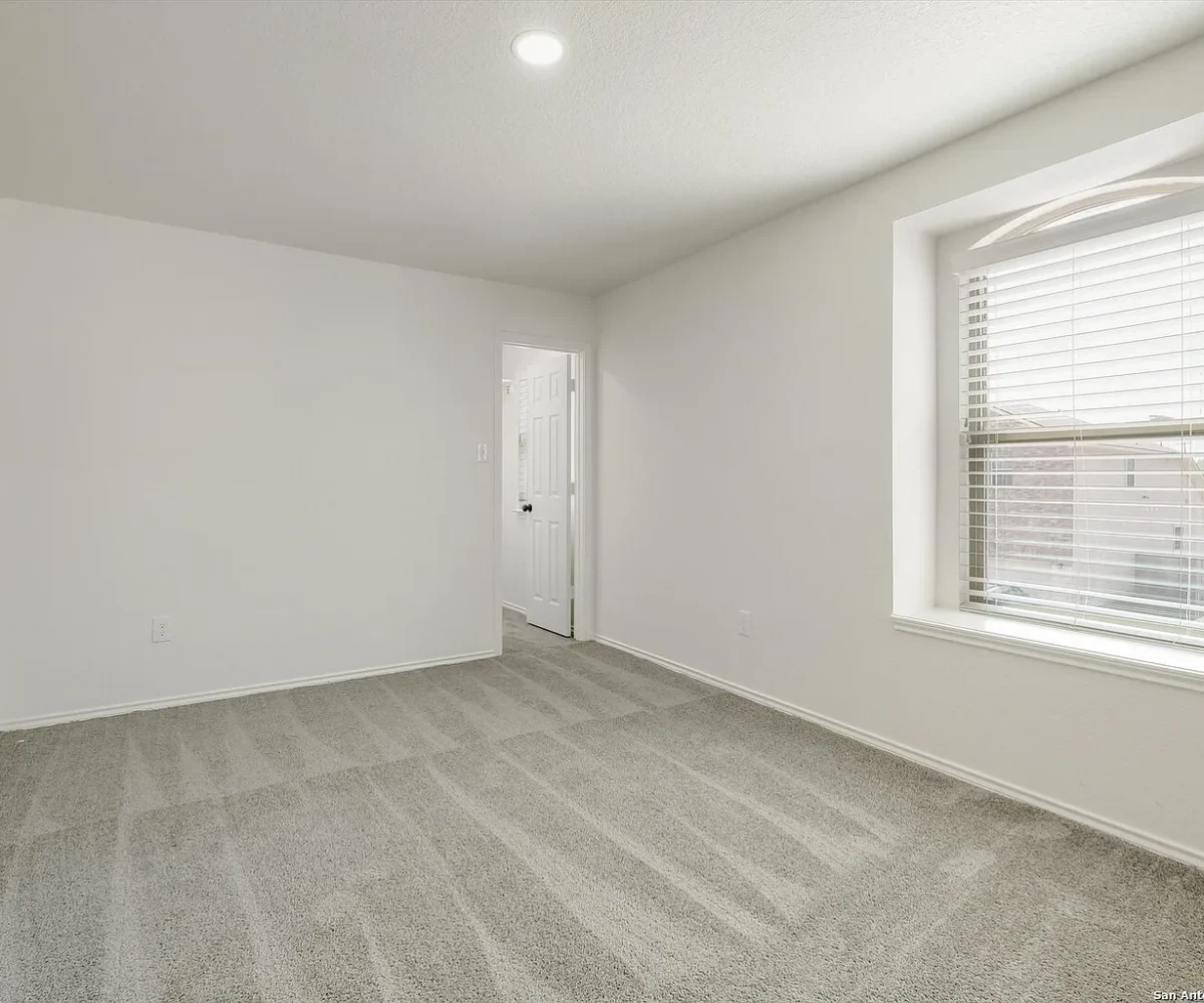 Bedroom of a KB home for sale.