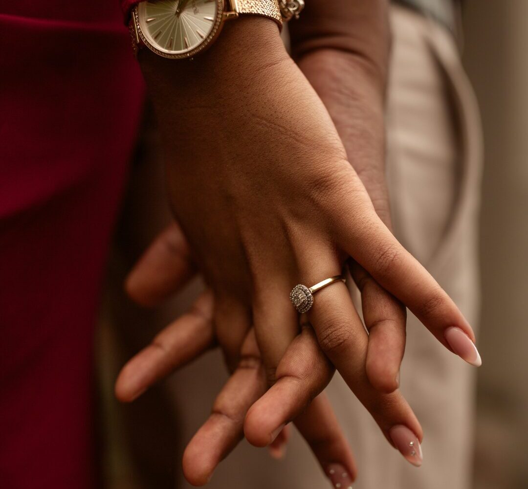 Close up of a couple holding hands representing Valentine's Day in San Antonio.
